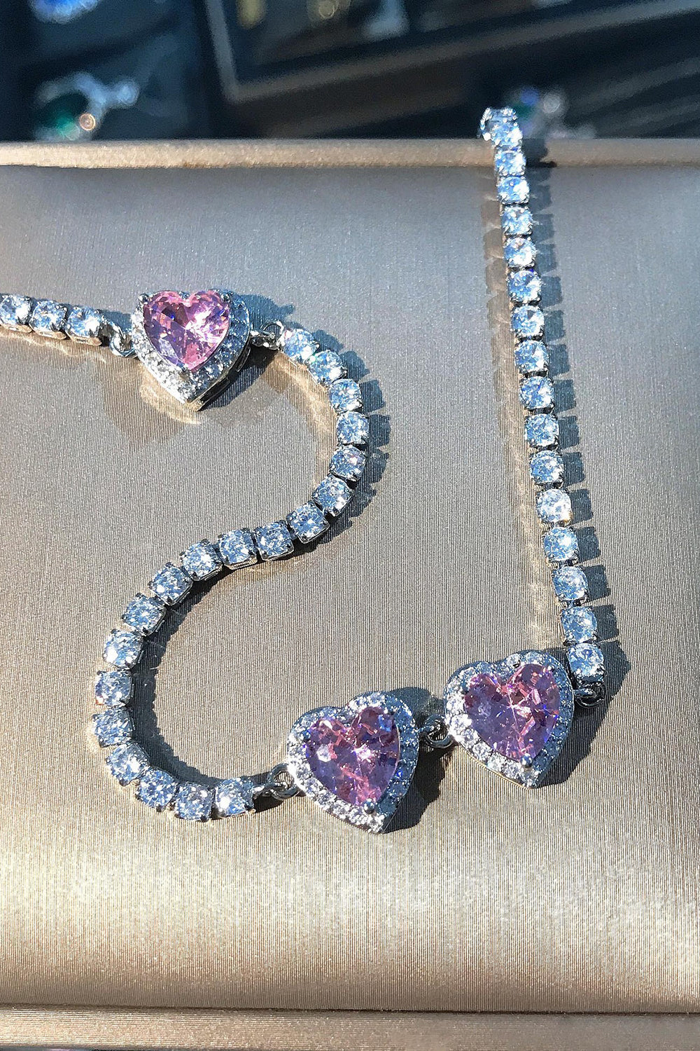 Collier rond rose avec strass coeur