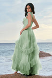 Robe de demoiselle d’honneur corset en tulle bleu avec volants