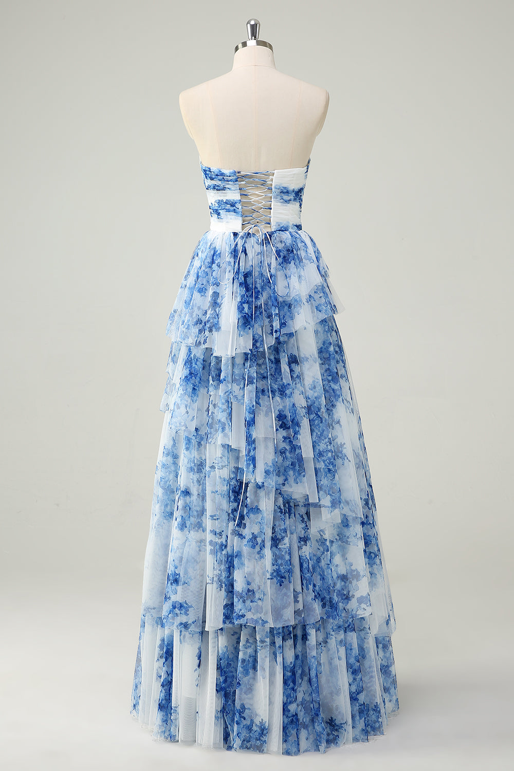 Robe de bal longue sans bretelles à volants avec noeuds