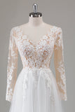 Robe de mariée ivoire à manches longues à col en V appliquée avec fente