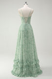 Robe de demoiselle d'honneur longue à bretelles spaghetti et imprimé floral vert avec fente