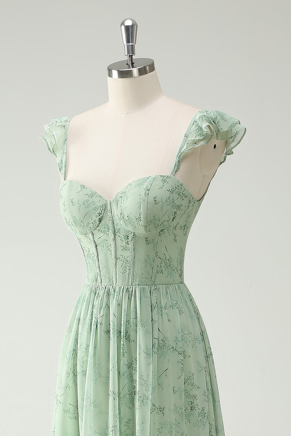 Une ligne de fleurs vertes volants bretelles longue robe de bal corset avec fendu sur le devant