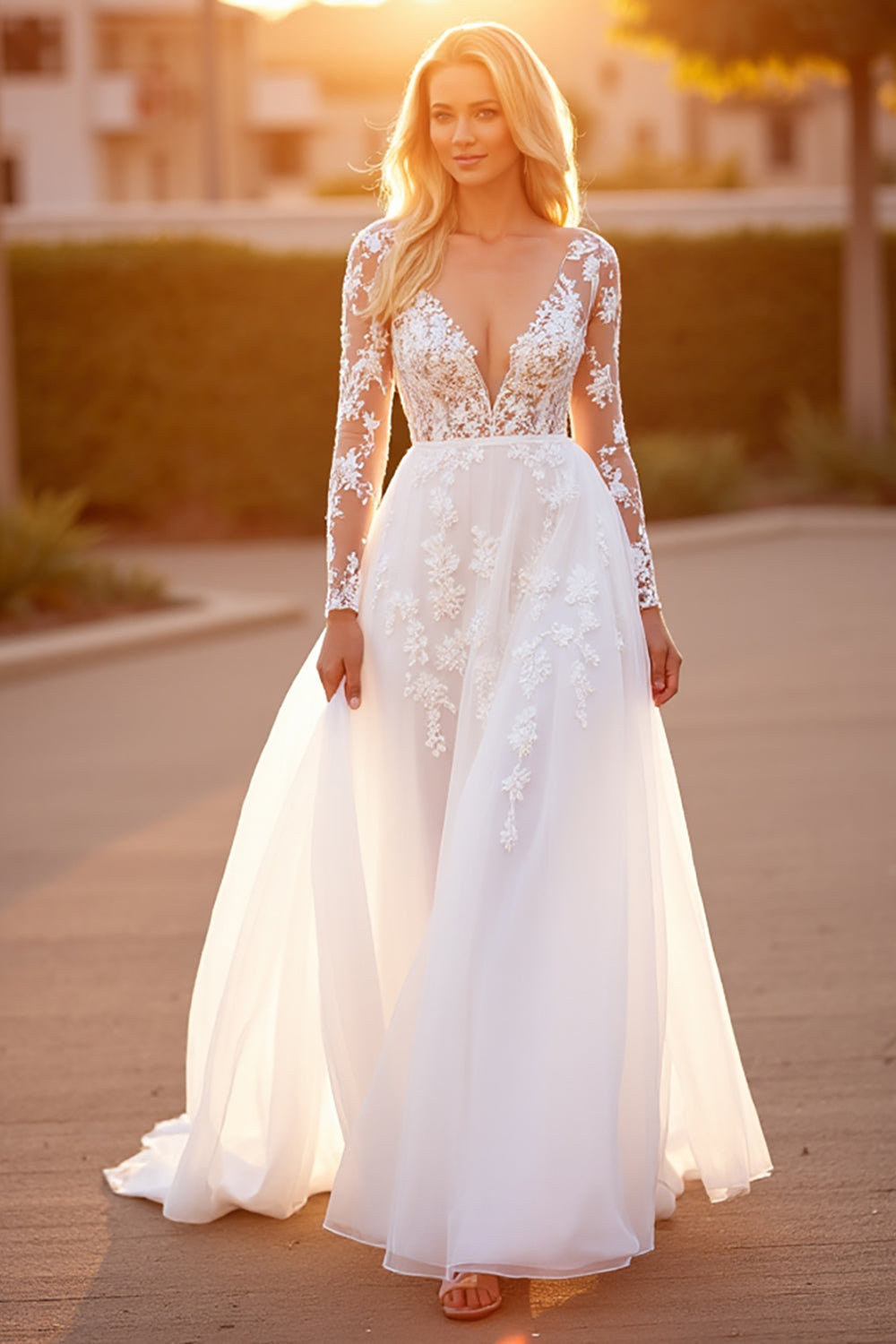Robe de mariée blanche à manches longues