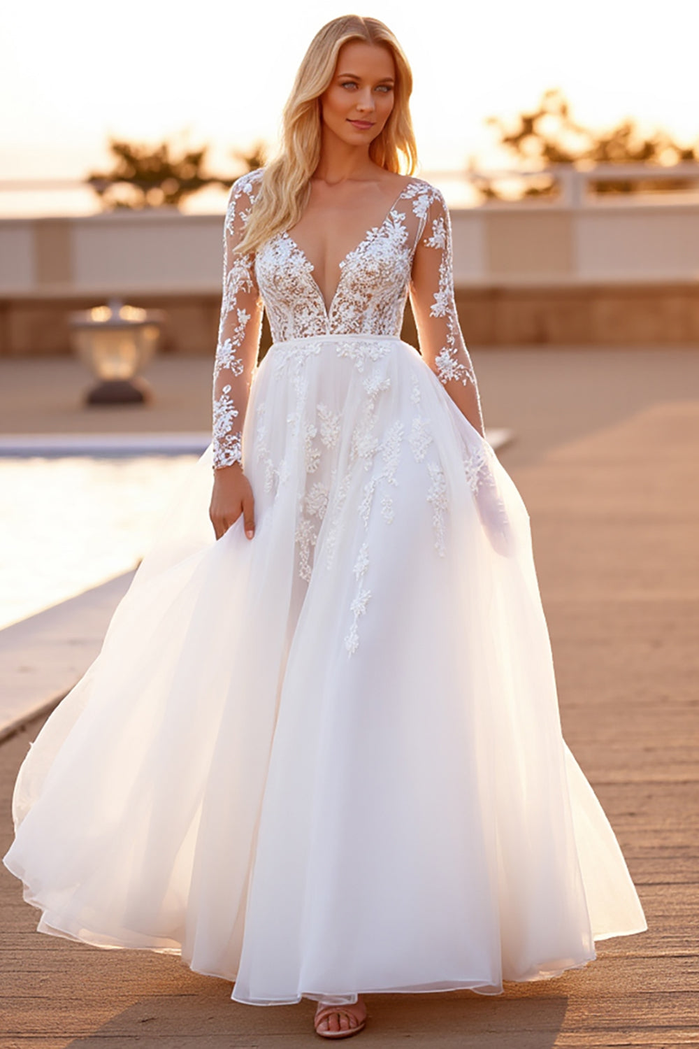 Robe de mariée blanche à manches longues