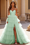 Robe de bal longue en tulle blush avec appliques