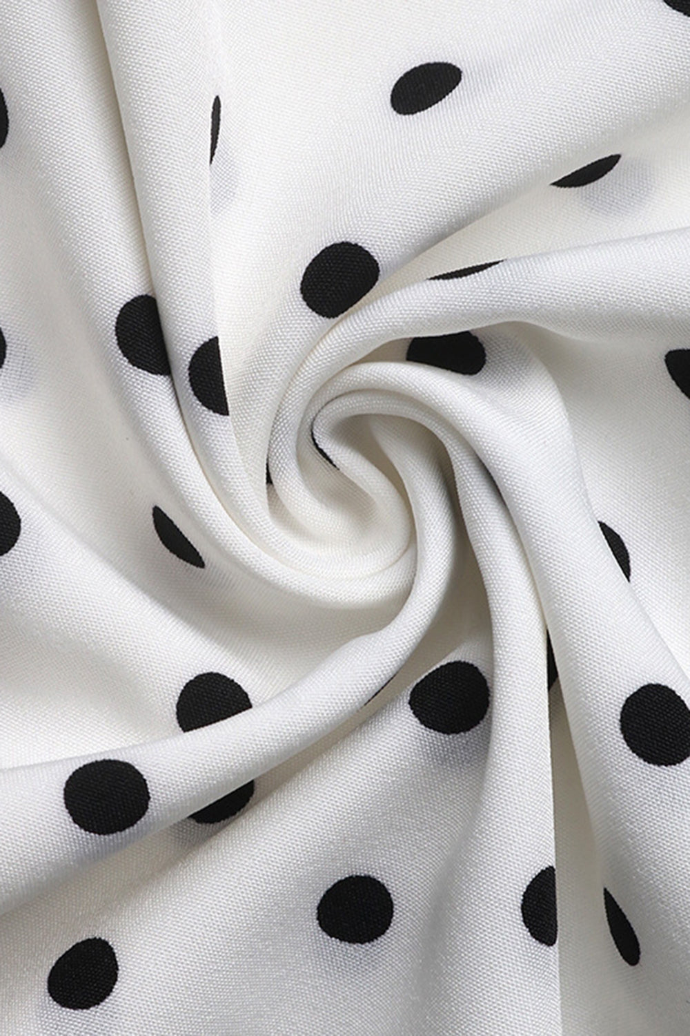 Robe d’été dos nu à pois noirs blancs avec nœud