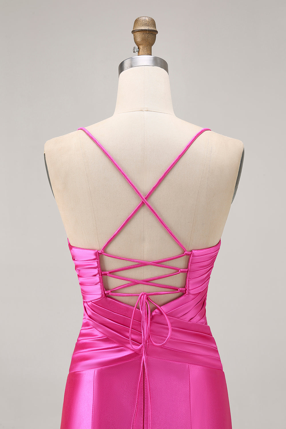 Robe de bal plissée moulante découpée fuchsia avec noeud