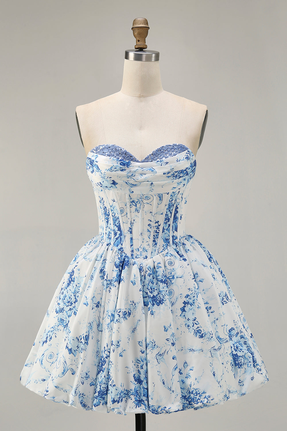 Robe de bal imprimée trapèze sans bretelles blanc bleu fleur avec perles
