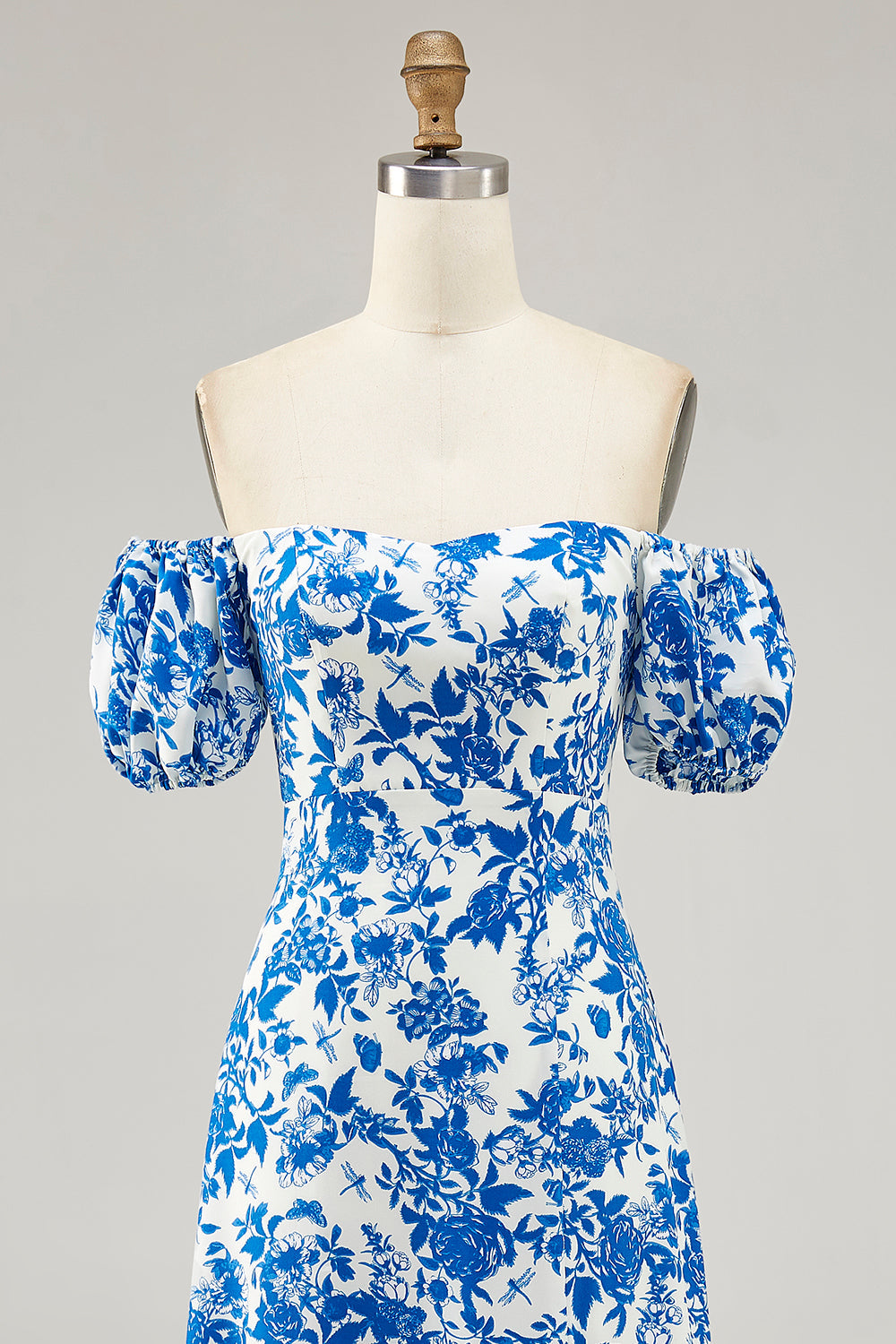 Robe d’invité de mariage bleue à imprimé floral avec fente