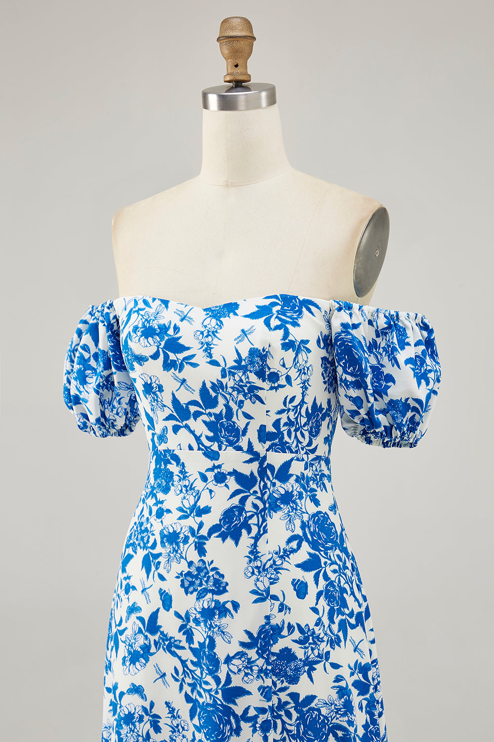 Robe d’invité de mariage bleue à imprimé floral avec fente