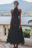 Robe à pois noir blanc à col haut