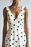 Robe midi à pois noirs blancs à col en V