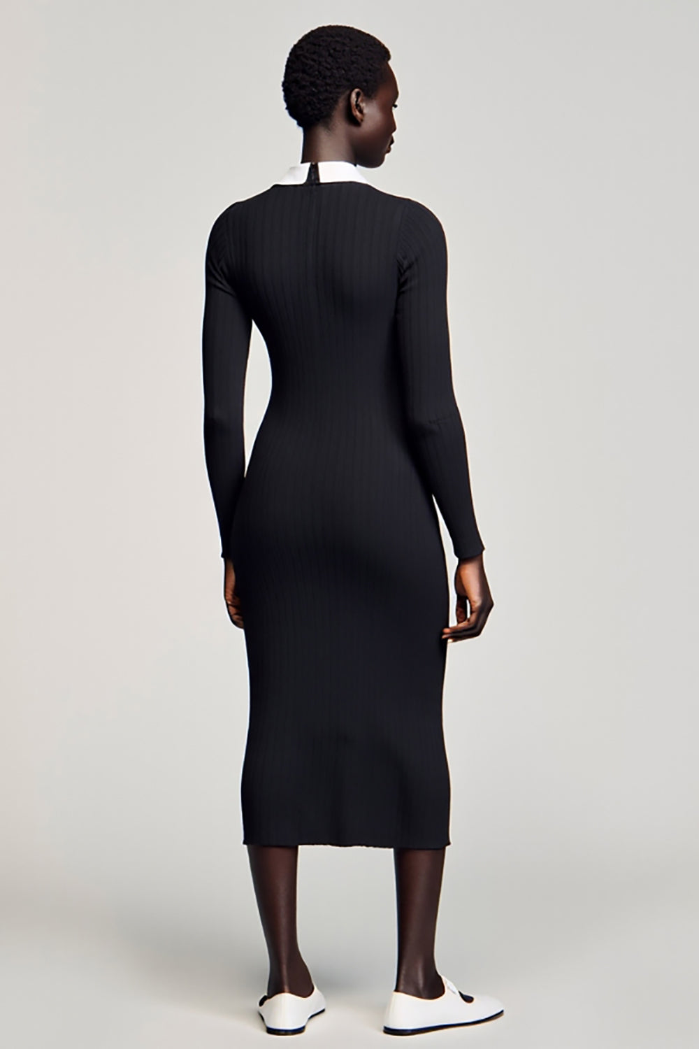 Fourreau en jersey noir Robe