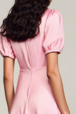 Robe midi en satin rose avec manches bouffantes