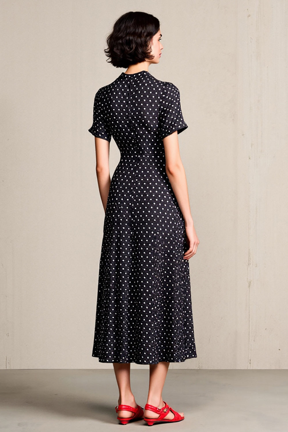 Robe noire à pois