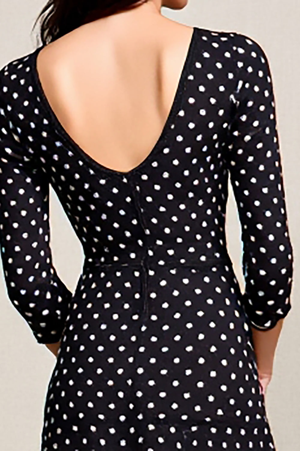 Robe à pois noirs avec fente