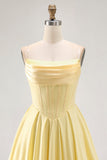 Robe de cocktail corset trapèze sans bretelles jaune avec perles