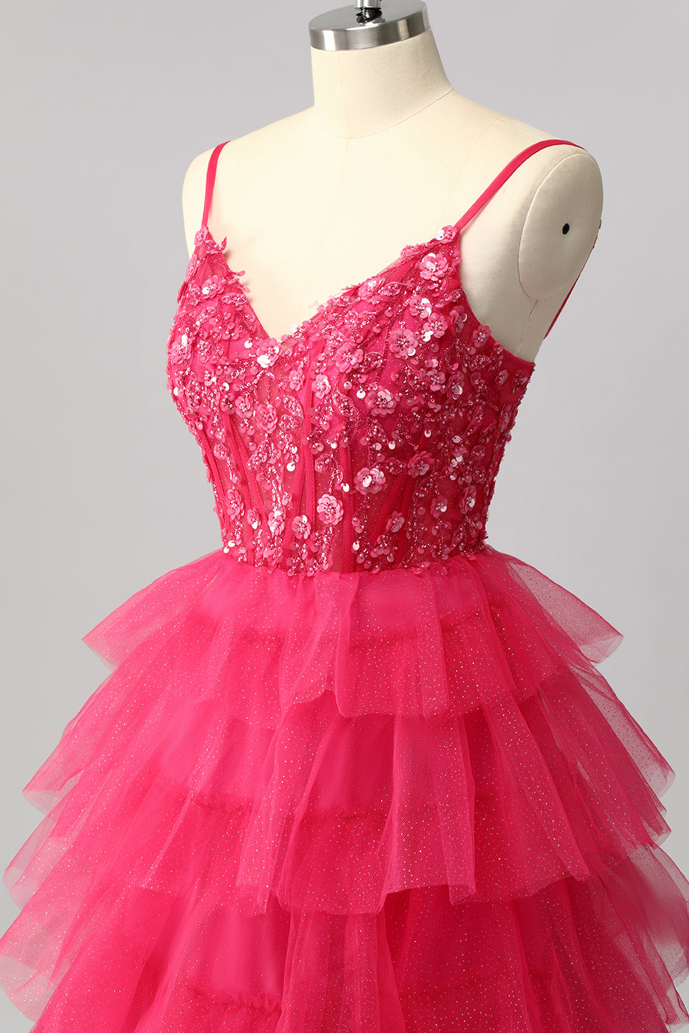 Robe de bal longue à plusieurs niveaux fuchsia scintillante avec appliques