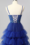 Corset bleu royal scintillant Une robe de bal longue à plusieurs niveaux avec appliques