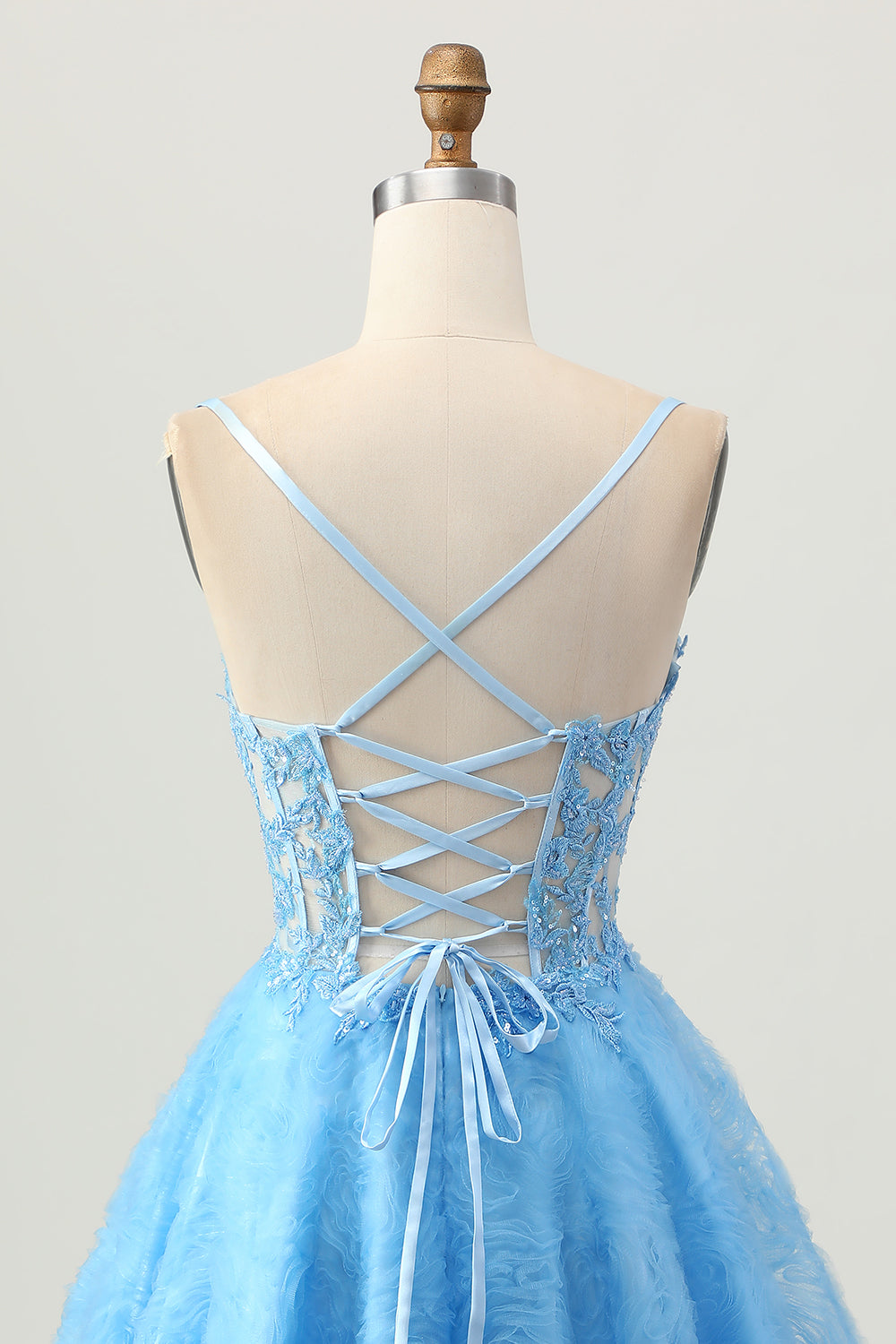 Une ligne bleue corset court de retour à la maison avec appliques
