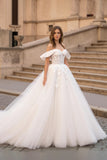 Robe de mariée ivoire en tulle corset à épaules dénudées