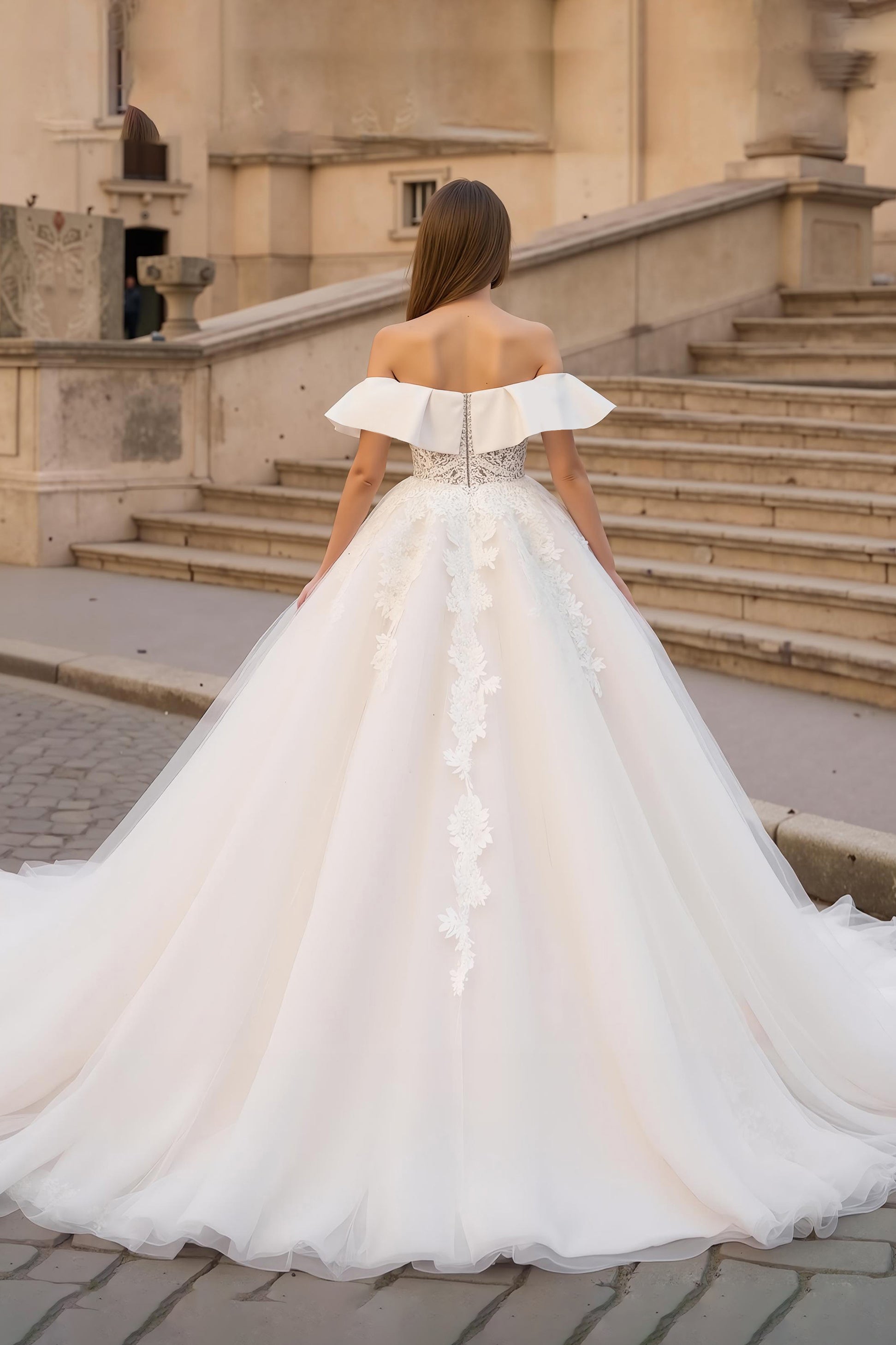Robe de mariée ivoire en tulle corset à épaules dénudées