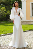 Robe de mariée sirène perlée à manches longues ivoire