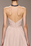 Robe de soirée longue dos nu en satin champagne avec perles