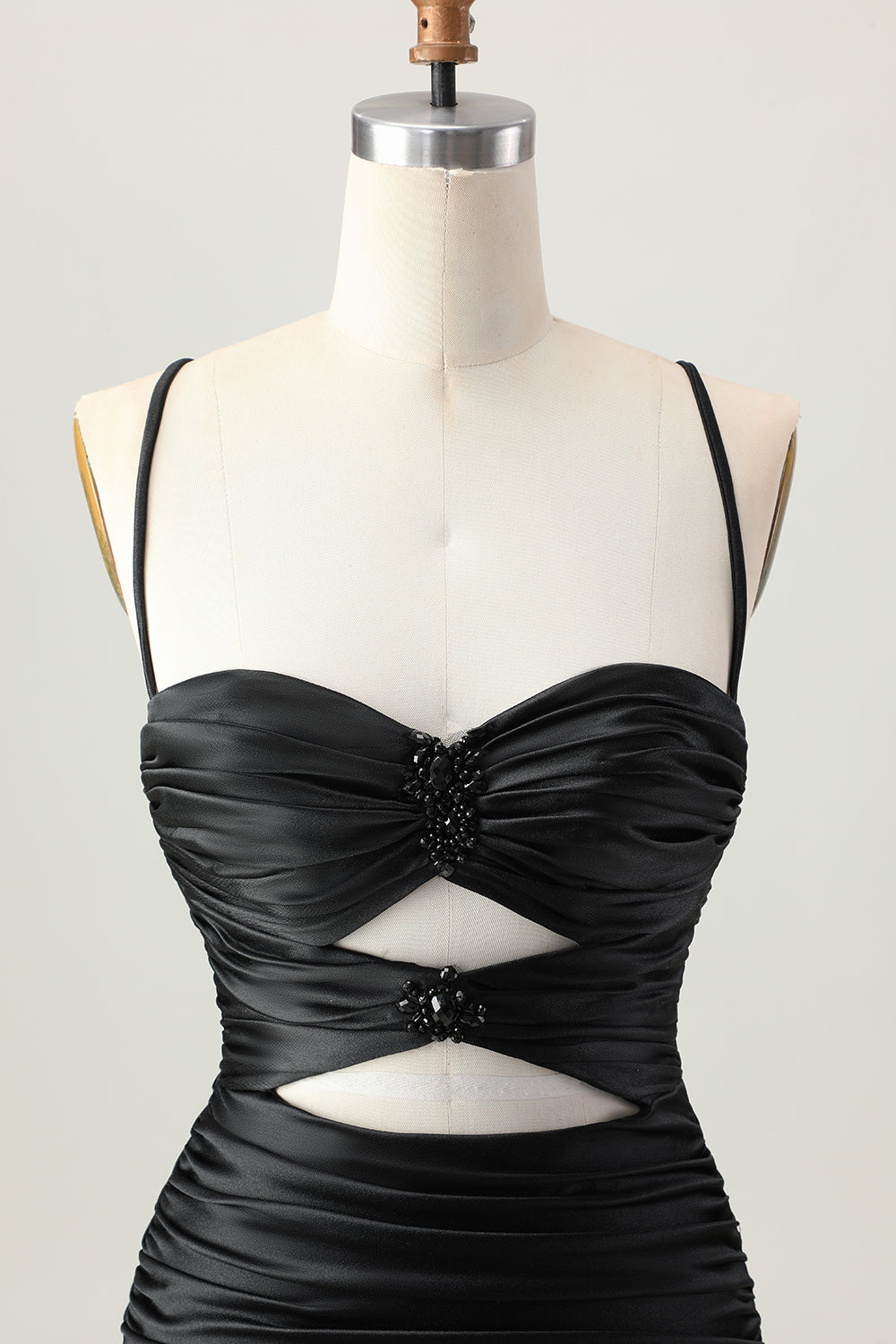 Robe de cocktail moulante kaki foncé avec découpes et dos lacé