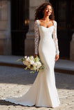 Robe de mariée en dentelle de sirène blanche appliquée à la traîne de cour