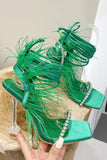Sandales à talons aiguilles à lanières fuchsia scintillantes avec plume