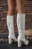 Bottes blanches à talons larges à bout pointu et à talons épais