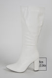 Bottes blanches à talons larges à bout pointu et à talons épais