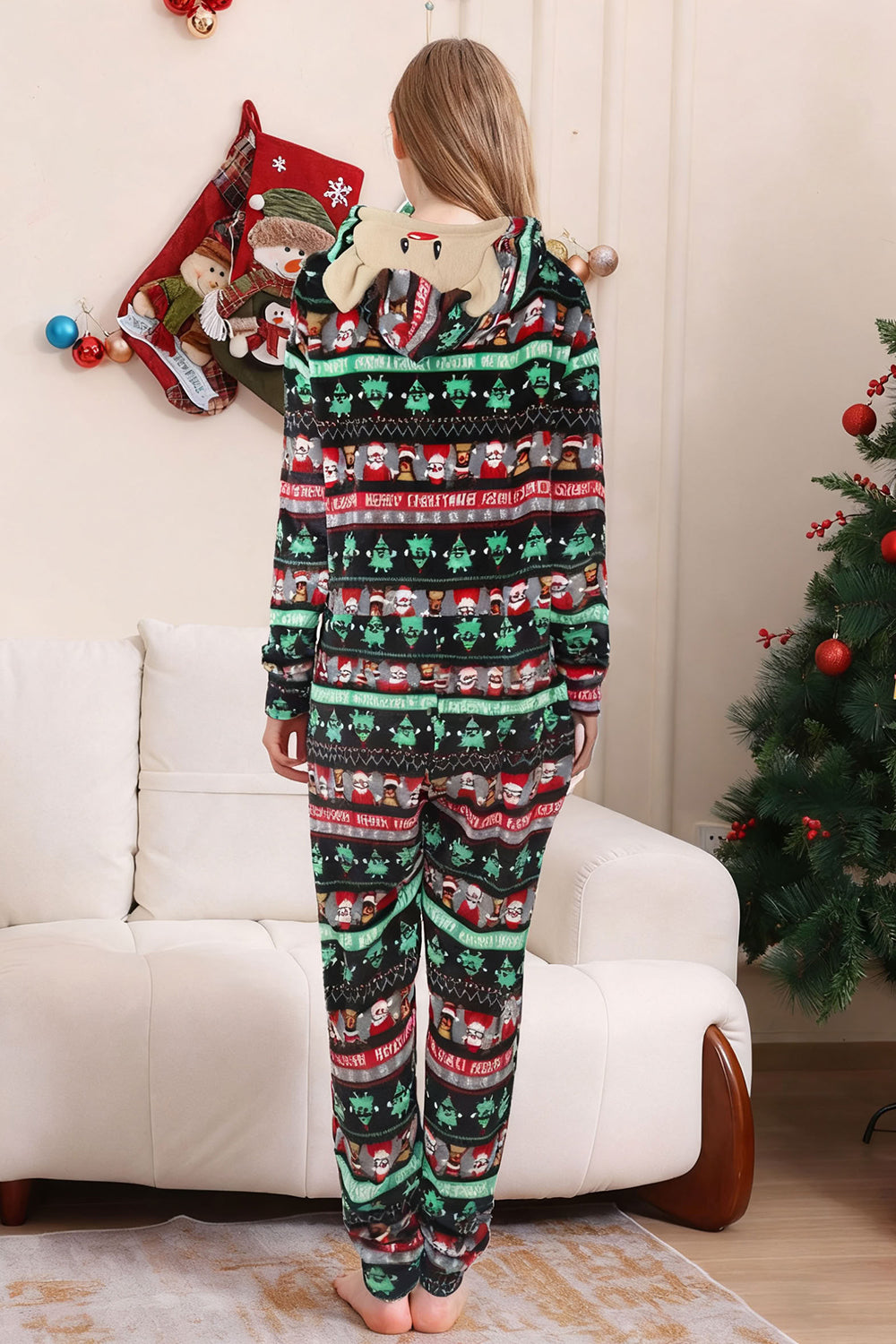 Pyjama de famille une pièce noir motif sapin de Noël assorti