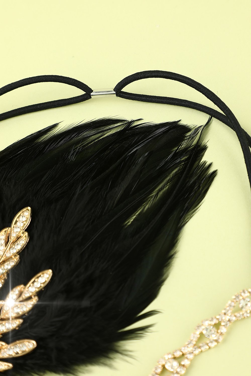 Bandeau à clapet perle plume noire des années 1920