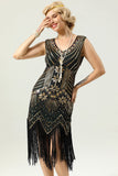 Robe à paillettes noires et dorées des années 1920