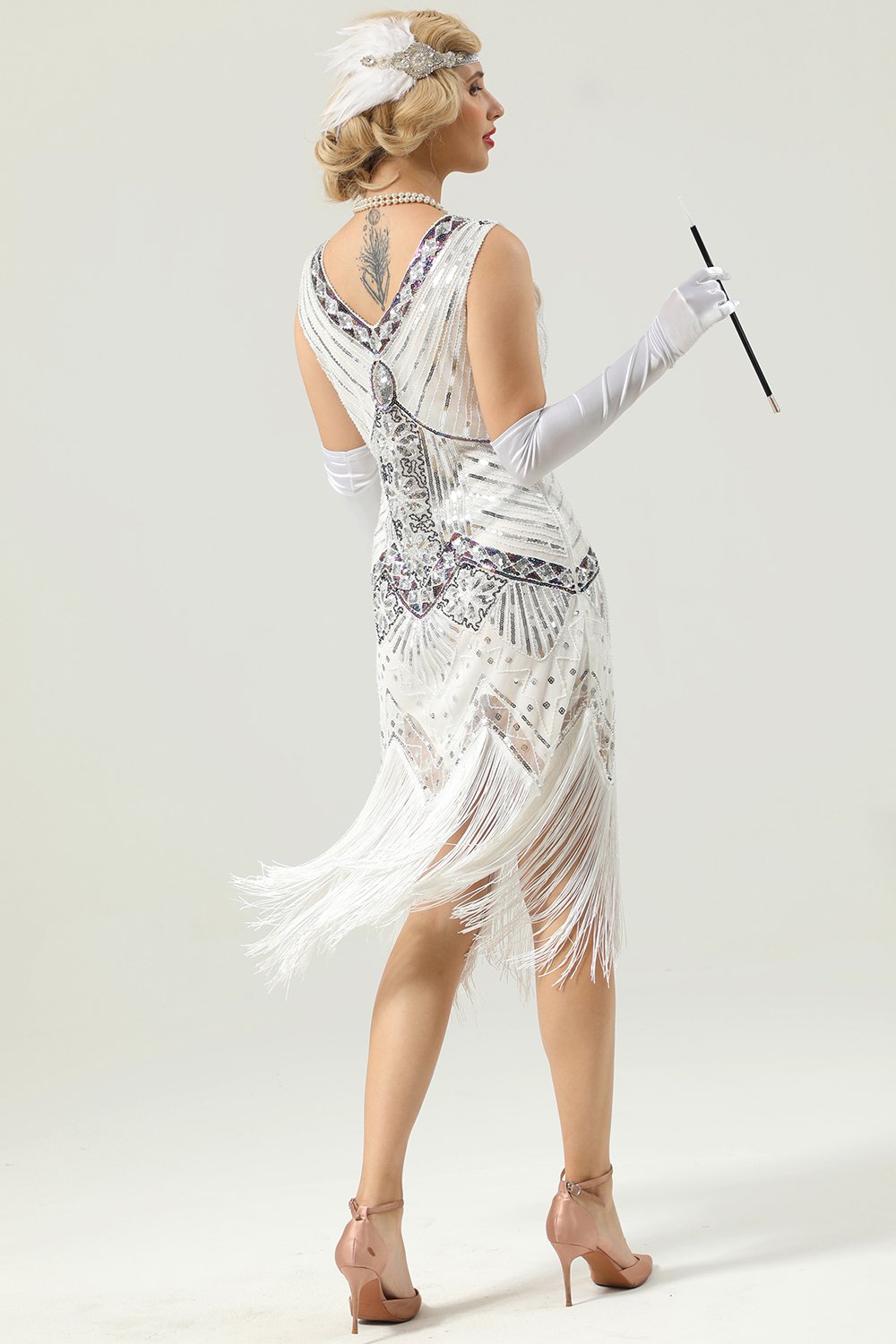 Robe à paillettes noires et dorées des années 1920