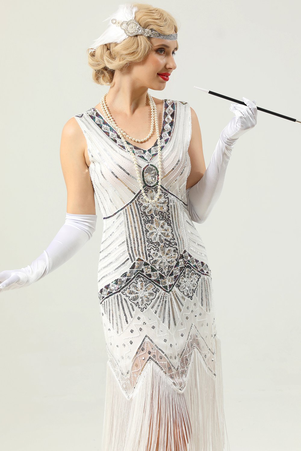 Robe à paillettes noires et dorées des années 1920