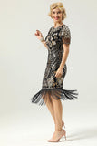 Robe à paillettes noir et or 1920 avec manches Batwing
