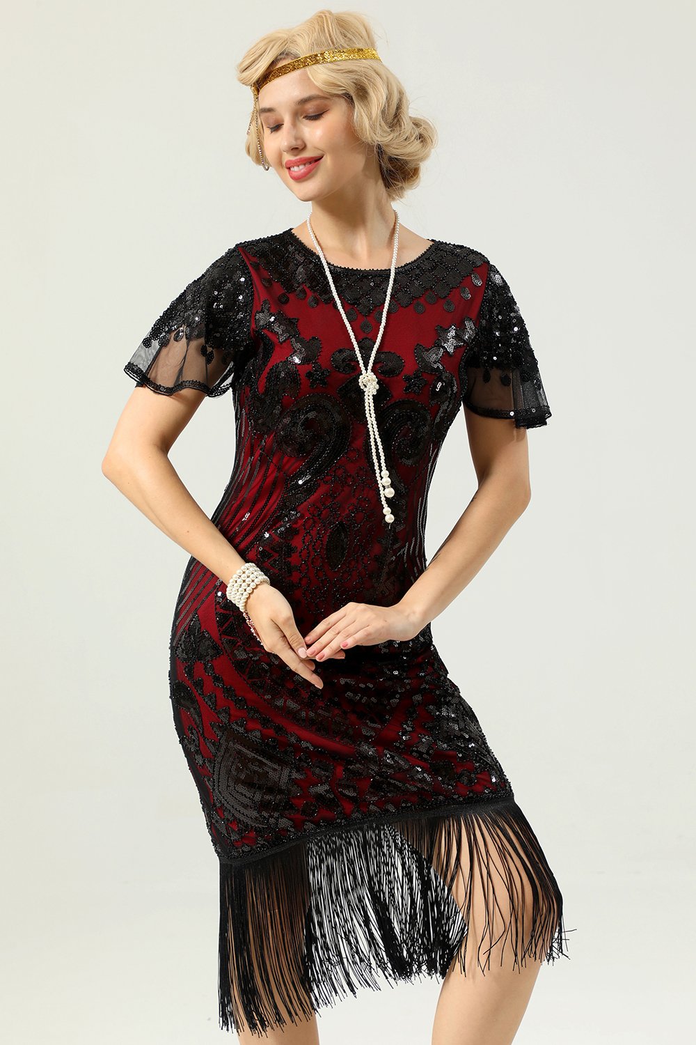 Robe à paillettes noir et or 1920 avec manches Batwing