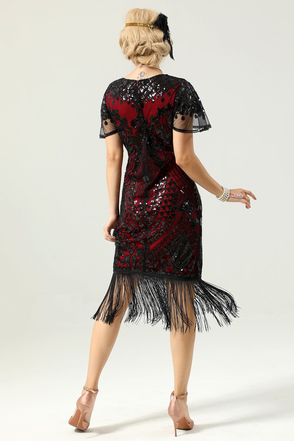 Robe à paillettes noir et or 1920 avec manches Batwing
