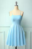 Robe de cocktail bleu dos nu