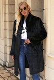 Manteau shearling noir en fausse fourrure avec ceinture