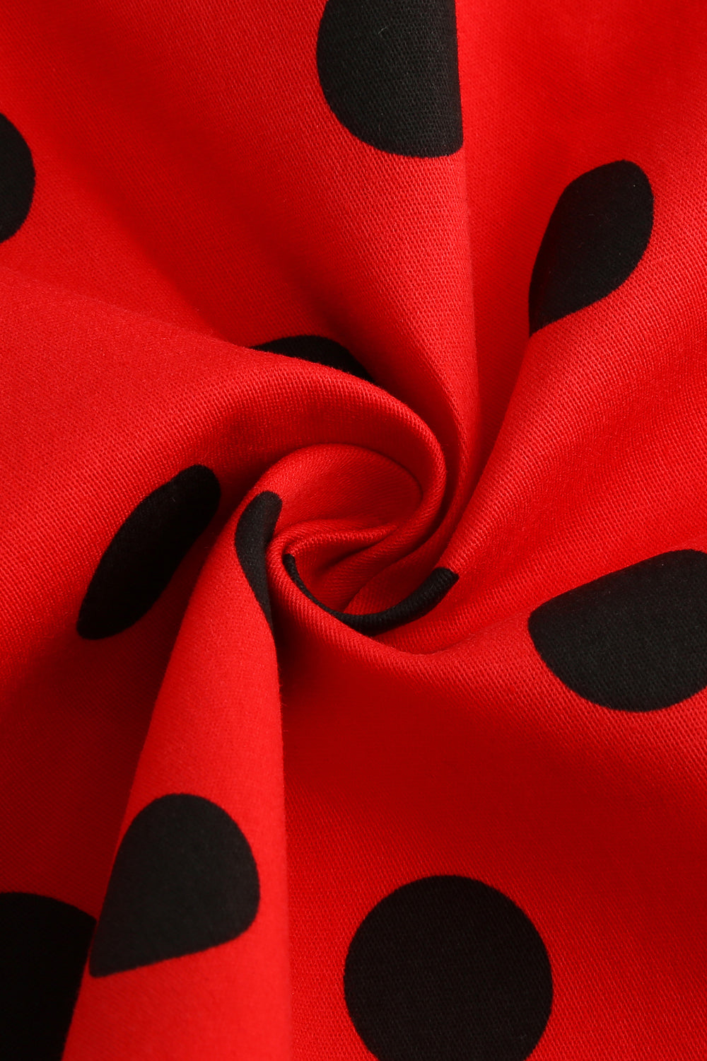 Robe à pois blancs à manches courtes