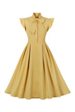 Robe jaune Solid Swing des années 50 avec nœud