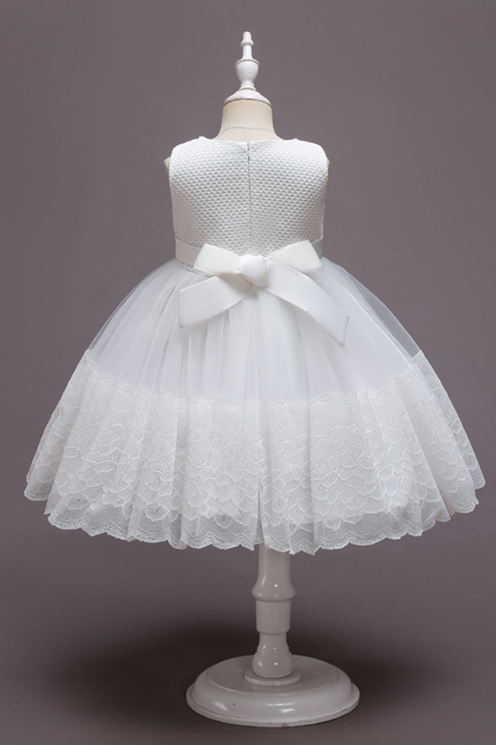 Robe de fille en tulle de fleurs rose sans manches avec nœud