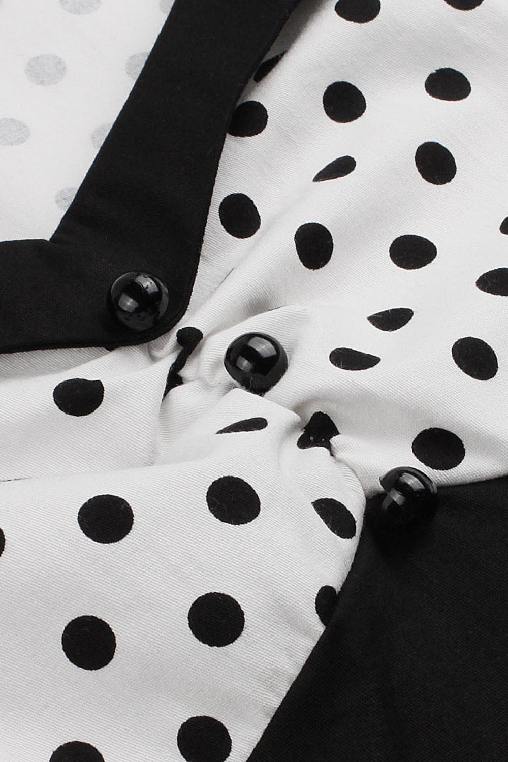 Robe noire à pois swing des années 50 à manches courtes