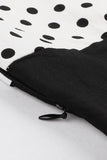 Robe noire à pois swing des années 50 à manches courtes