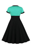 Robe noire à pois swing des années 50 à manches courtes