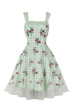 Robe verte à carreaux des années 50 avec imprimé floral